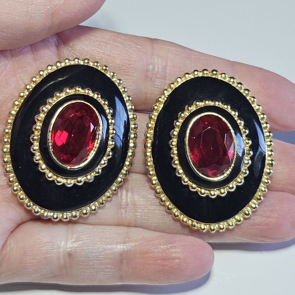 Vintage Gold Tone Black Enamel Red Faceted Rhinestone Oval Clip On Earrings